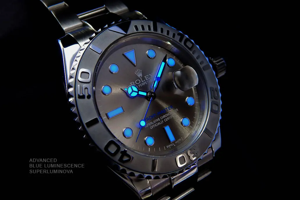 Rolex Yacht-Master replica watch glowing in the dark with advanced blue Super-Luminova luminescence for superior low-light performance.