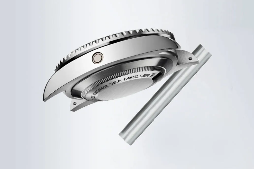 Helium escape valve on Rolex Sea-Dweller replica watch for deep-dive pressure resistance and professional waterproofing features.